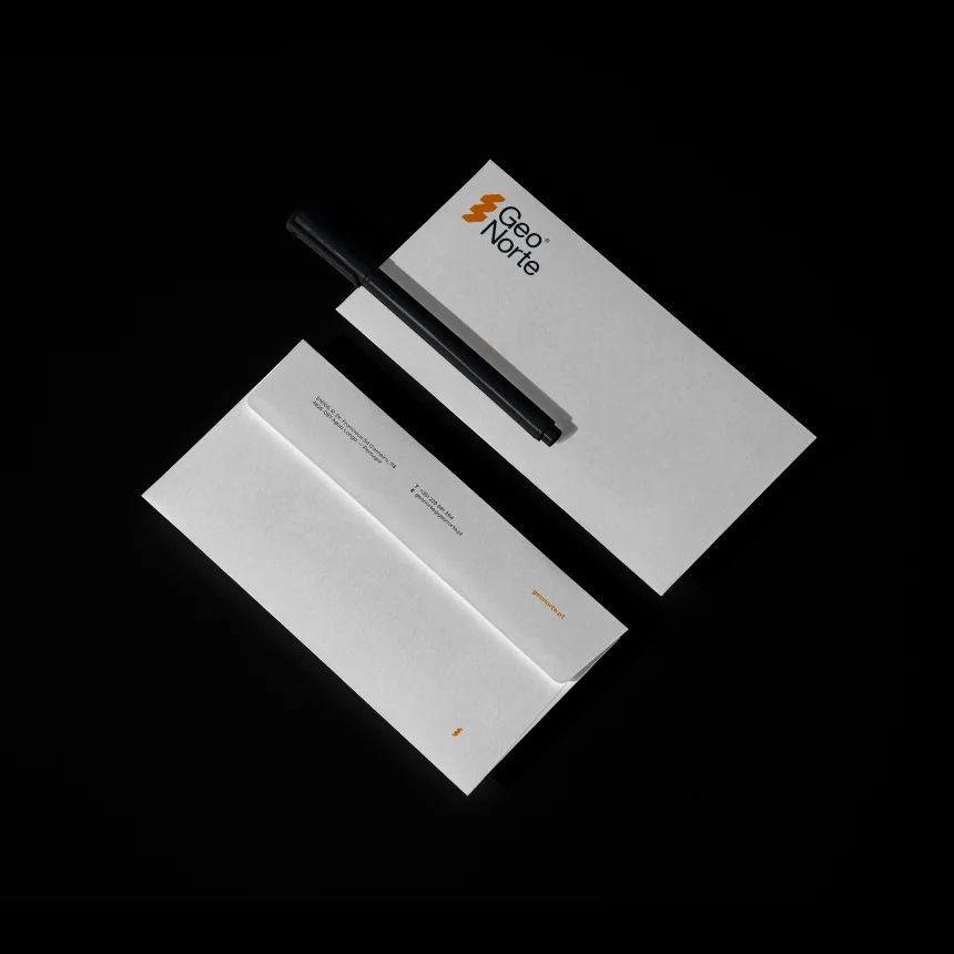 Projeto GeoNorte da Nhdesign: Carta e caneta da marca com informações da empresa