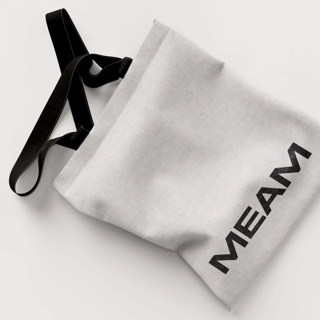 Projeto Meam Concept da Nhdesign: Tote bag branca com o logótipo da Meam Concept
